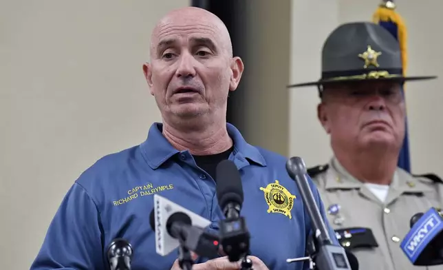 Laurel County Sheriff's Captain Richard Dalrymple gives an update at the London Community Center in London, Ky., Sunday, Sept. 8, 2024, on the efforts to find the suspect in the Saturday shooting at Interstate 75 near Livingston, Ky. (AP Photo/Timothy D. Easley)