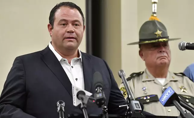 London Mayor Randall Weddle gives an update at the London Community Center in London, Ky., Sunday, Sept. 8, 2024, on the efforts to find the suspect in the Saturday shooting at Interstate 75 near Livingston, Ky. (AP Photo/Timothy D. Easley)