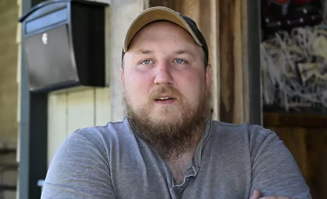 Cody Shepherd talks about all of the rumors that circulated following a shooting on Saturday along Interstate 75 near London, Ky., Sunday, Sept. 8, 2024. (AP Photo/Timothy D. Easley)