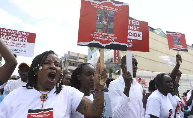 Activists and relatives of Ugandan Olympic athlete Rebecca Cheptegei march calling for an end to femicide in the western city of Eldoret, in Rift Valley, Kenya Friday, Sept. 13, 2024. (AP Photo/Andrew Kasuku)