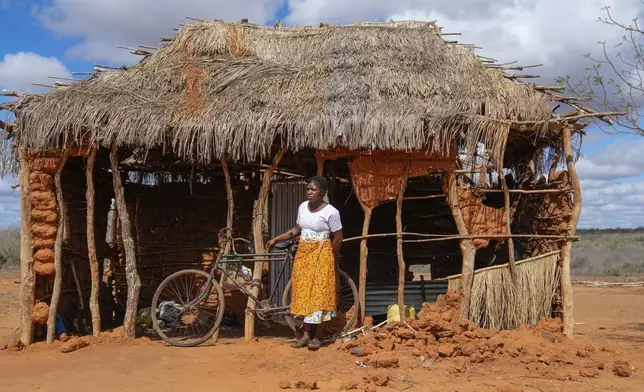 Salama Masha, a former follower of extremist evangelical leader Paul Mackenzie, stands outside a makeshift house near the scene where dozens of bodies were found in shallow graves in the village of Shakahola, near the coastal city of Malindi, in southern Kenya, on Thursday, Sept. 5, 2024. (AP Photo/Brian Inganga)