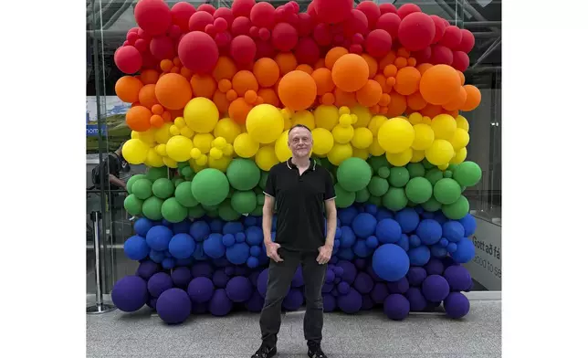 This August 2024 photo shows Mark Chesnut at the Keflavík International Airport in Iceland. Chesnut, a travel blogger and speaker, said LGBTQ+ tourists are concerned about safety in some spots due to the erosion of their human rights in the U.S. and around the world. (Malik Haddington-Ahmed via AP)