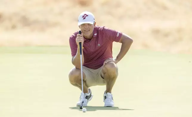 Matt Jones, of Ripper GC, reads his putt on the fourth green during the final round of LIV Golf Team Championship Dallas at Maridoe Golf Club, Sunday, Sept. 22, 2024, in Carrollton, Texas. (Charles Laberge/LIV Golf via AP)