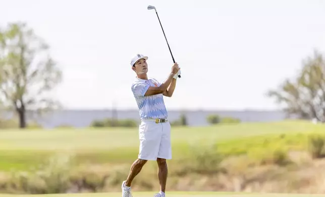 Captain Kevin Na, of Iron Heads GC, hits from the second fairway during the final round of LIV Golf Team Championship Dallas at Maridoe Golf Club, Sunday, Sept. 22, 2024, in Carrollton, Texas. (Chris Trotman/LIV Golf via AP)