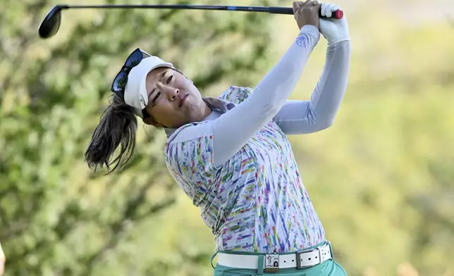 Jasmine Suwannapura, of Thailand, tees off on the first hole during the LPGA Walmart NW Arkansas Championship golf tournament, Sunday, Sept. 29, 2024, in Rogers, Ark. (AP Photo/Michael Woods)