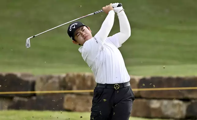 Liqi Zeng, of China, watches her tee shot on the sixth hole during the first round of the LPGA Walmart NW Arkansas Championship golf tournament, Friday, Sept. 27, 2024, in Rogers, Ark. (AP Photo/Michael Woods)