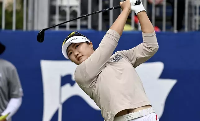 Haeran Ryu, of South Korea, watches her shot off the first tee during the first round of the LPGA Walmart NW Arkansas Championship golf tournament, Friday, Sept. 27, 2024, in Rogers, Ark. (AP Photo/Michael Woods)