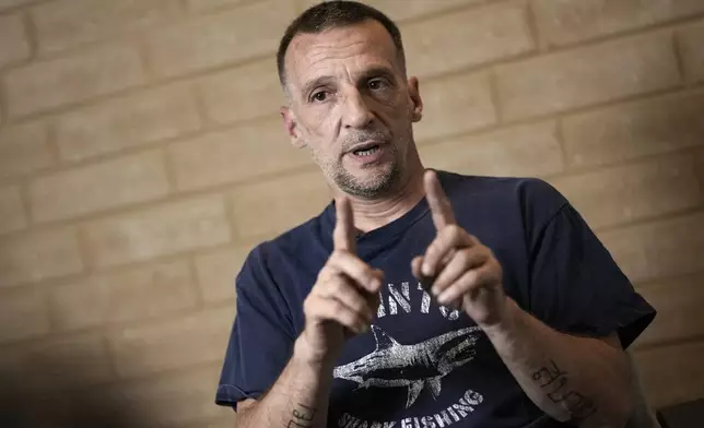 Mathieu Kassovitz speaks during an interview with Associated Press, in Tremblay-en-France, Tuesday, Sept. 17, 2024. (AP Photo/Christophe Ena)