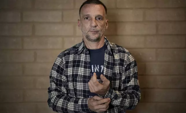 Mathieu Kassovitz poses after an interview with Associated Press, in Tremblay-en-France, Tuesday, Sept. 17, 2024. (AP Photo/Christophe Ena)