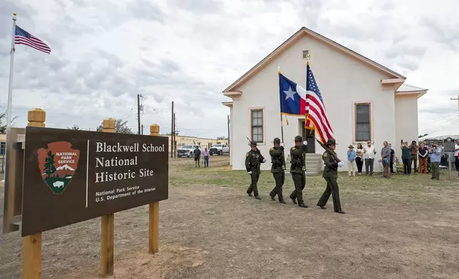 A Border Patrol color guard conducts the presentation of colors during the inauguration of Blackwell School as the newest National Historic Site in Marfa, Texas, Saturday, Sept. 14, 2024. (AP Photo/Andres Leighton)