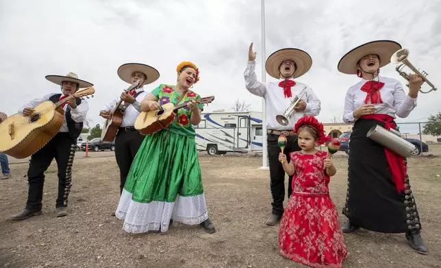 A Mariachi band performs during the ribbon-cutting ceremony to inaugurate Blackwell School as the newest National Historic Site in Marfa, Texas, Saturday, Sept. 14, 2024. (AP Photo/Andres Leighton)