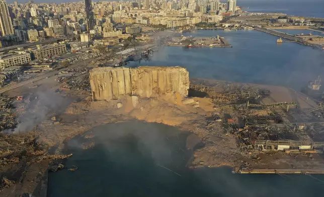 FILE - A drone picture shows the scene of an explosion that hit the seaport of Beirut, Lebanon, on Aug. 5, 2020. (AP Photo/Hussein Malla, File)