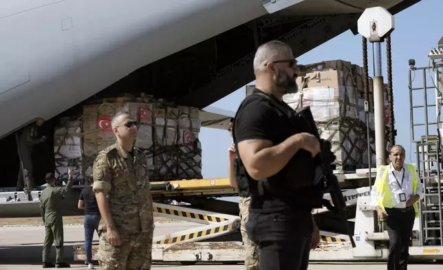 A Turkish Air Force airplane brings medical aid boxes at Beirut International airport, Wednesday, Sept. 25, 2024. (AP Photo/Bilal Hussein)