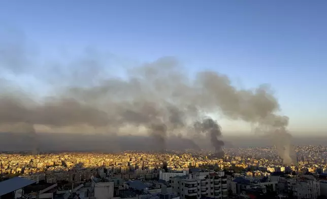 Smoke rises from Israeli airstrikes in the southern suburbs of Beirut, Lebanon, Saturday, Sept. 28, 2024. (AP Photo/Hussein Malla)