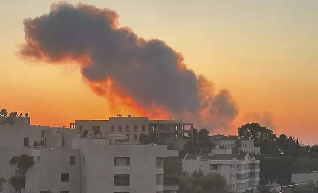 Smoke rises from Israeli airstrikes in Beirut, seen from Baabda, Friday, Sept. 27, 2024. (AP Photo)