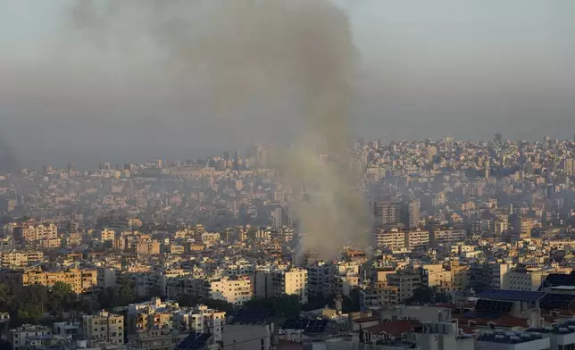 Smoke rises from an Israeli airstrike in the southern suburbs of Beirut, Lebanon, Saturday, Sept. 28, 2024. AP Photo/Hussein Malla)