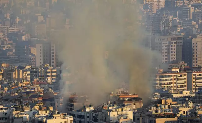 Smoke rises from an Israeli airstrike in the southern suburbs of Beirut, Lebanon, Saturday, Sept. 28, 2024. (AP Photo/Hussein Malla)