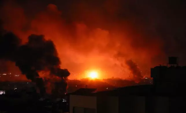 Smoke and fire rise following an Israeli airstrikes in Beirut's southern suburbs, Lebanon, Saturday, Sept. 28, 2024. (AP Photo/Hassan Ammar)