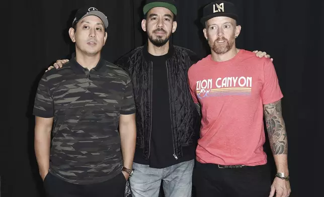 FILE - Joe Hahn, from left, Mike Shinoda and Dave Farrell pose backstage after Linkin Park and Friends Celebrate Life in Honor of Chester Bennington at the Hollywood Bowl on Friday, Oct. 27, 2017, in Los Angeles. (Photo by Richard Shotwell/Invision/AP, File)