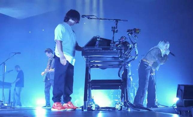 Mike Shinoda, from left, Alex Feder (filling in for guitarist Brad Delson), Joe Hahn, and Emily Armstrong of Linkin Park performs Thursday, Sept. 5, 2024, in Los Angeles. It was announced on Thursday that Dead Sara's Emily Armstrong would join as the band's new co-singer and songwriter/producer Colin Brittain would join on drums. Linkin Park will release the album "From Zero" on Nov. 15, marking their first new record since former frontman Chester Bennington died in 2017. (Photo by Jordan Strauss/Invision/AP