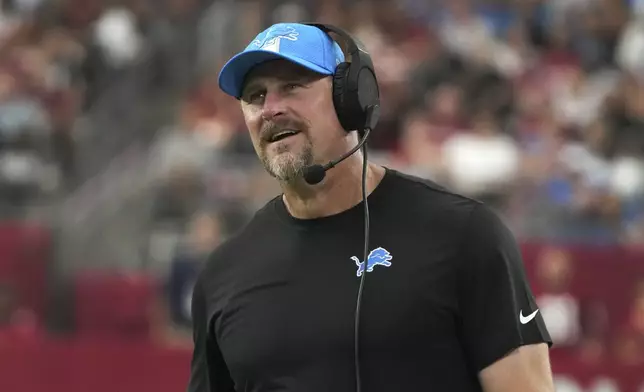 Detroit Lions head coach Dave Campbell watches against the Arizona Cardinals during the second half of an NFL football game Sunday, Sept. 22, 2024, in Glendale, Ariz. (AP Photo/Rick Scuteri)