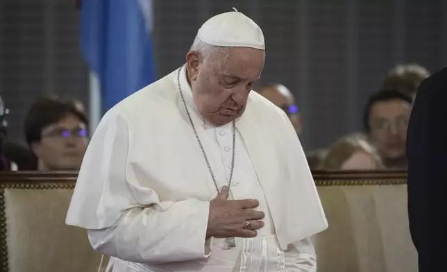 Pope Francis attends the welcome ceremony upon his arrival at Findel International Airport in Luxembourg, Thursday, Sept. 26, 2024. (AP Photo/Andrew Medichini)