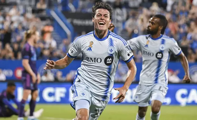 Montreal's Caden Clark (23) reacts after scoring against Charlotte during the first half of an MLS soccer match in Montreal, Saturday, Sept. 14, 2024. (Graham Hughes/The Canadian Press via AP)