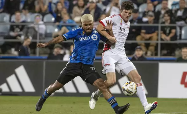 CF Montreal's Josef Martinez, left, battles San Jose Earthquakes' Daniel Munie during the first half of an MLS soccer match in Montreal, Saturday, September 28, 2024. (Peter McCabe/The Canadian Press via AP)