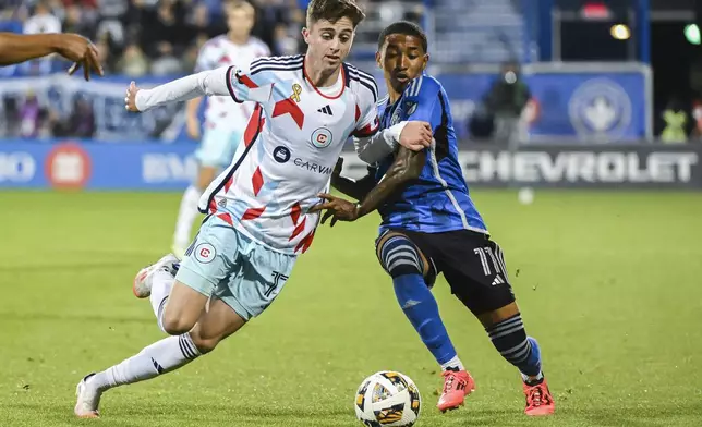 CF Montreal's Jahkeele Marshall-Rutty, right, challenges Chicago Fire's Brian Gutierrez, left, during second-half MLS soccer match action in Montreal, Saturday, Sept. 21, 2024. (Graham Hughes/The Canadian Press via AP)