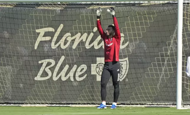 Inter Miami goalkeeper Drake Callender prepares to work out at the MLS soccer team's training facility, Friday, Sept. 13, 2024, in Fort Lauderdale, Fla. (AP Photo/Wilfredo Lee)