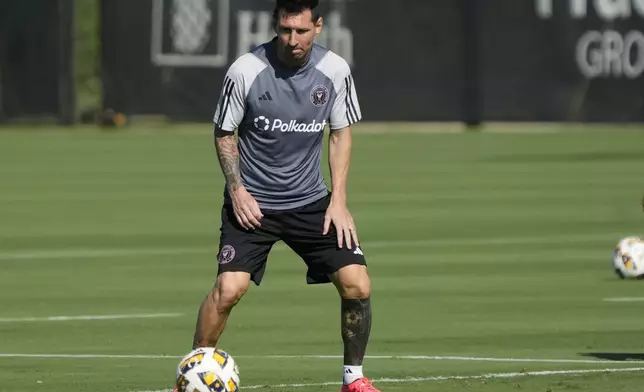 Inter Miami forward Lionel Messi works out with teammates at the MLS soccer team's training facility, Friday, Sept. 13, 2024, in Fort Lauderdale, Fla. (AP Photo/Wilfredo Lee)