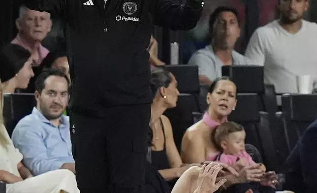 Inter Miami head coach Tara Mendoza reacts to a call by a referee after Inter Miami forward Lionel Messi (10) collided with a Philadelphia Union player during the second half of an MLS soccer match, Saturday, Sept. 14, 2024, in Fort Lauderdale, Fla. (AP Photo/Marta Lavandier)