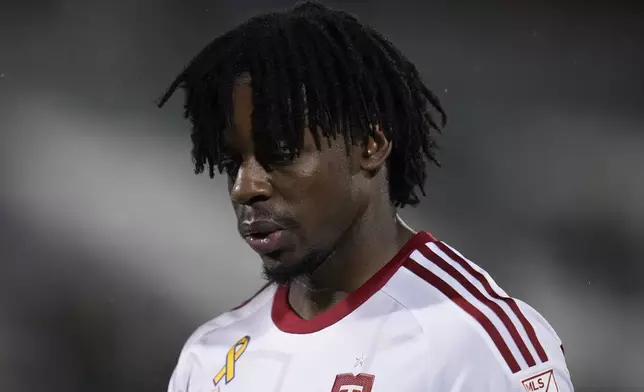 Toronto FC forward Deandre Kerr reacts after a loss to the Colorado Rapids in an MLS soccer match Saturday, Sept. 21, 2024, in Commerce City, Colo. (AP Photo/Jack Dempsey)