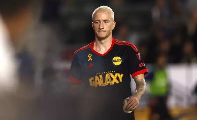 Los Angeles Galaxy's Marco Reus leaves the field during the second half of an MLS soccer match against the Vancouver Whitecaps, Saturday, Sept. 21, 2024, in Carson, Calif. (AP Photo/Etienne Laurent)