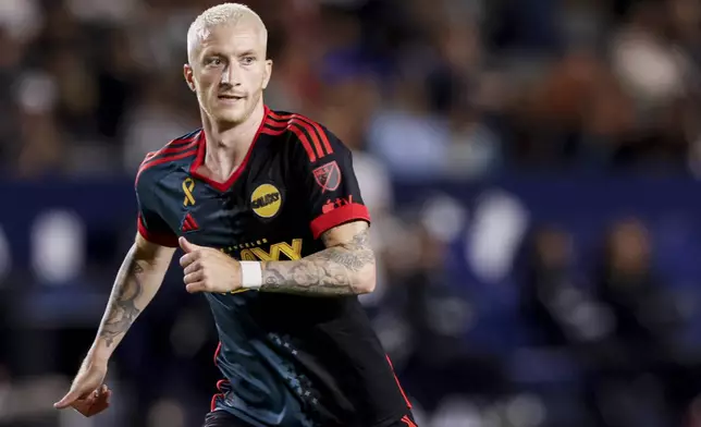 Los Angeles Galaxy's Marco Reus reacts during the second half of an MLS soccer match against the Vancouver Whitecaps, Saturday, Sept. 21, 2024, in Carson, Calif. (AP Photo/Etienne Laurent)