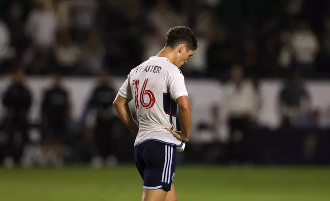 Vancouver Whitecaps' Sebastian Berhalter (16) reacts after Los Angeles Galaxy's Joseph Paintsil, not pictured, scored during the second half of an MLS soccer match Saturday, Sept. 21, 2024, in Carson, Calif. (AP Photo/Etienne Laurent)