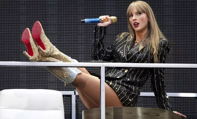 FILE - Taylor Swift performs at Wembley Stadium as part of her Eras Tour on Friday, June 21, 2024 in London. (Photo by Scott A Garfitt/Invision/AP, File)