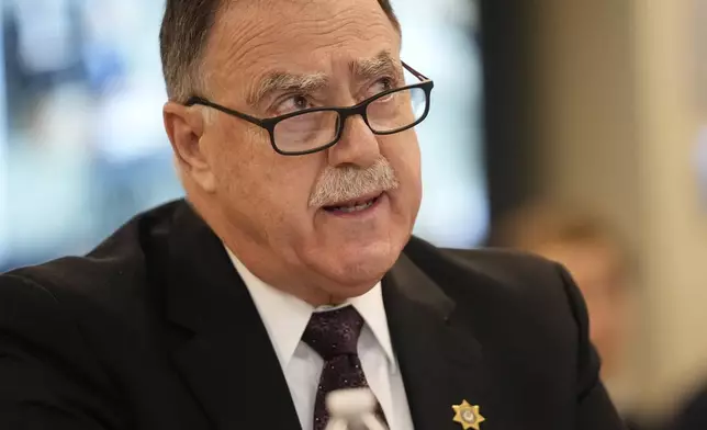 FILE - Sagadahoc Country Sheriff Joel Merry responds to questioning, Thursday, Jan. 25, 2024, in Augusta, Maine, during a hearing of the independent commission investigating the law enforcement response to the mass shooting in Lewiston, Maine. (AP Photo/Robert F. Bukaty, File)