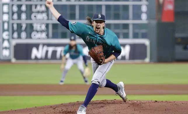 Seattle Mariners starting pitcher Logan Gilbert throws during the first inning of a baseball game against the Houston Astros, Tuesday, Sept. 24, 2024, in Houston. (AP Photo/Michael Wyke)