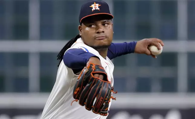 Houston Astros starting pitcher Framber Valdez throws during the first inning of a baseball game against the Seattle Mariners, Tuesday, Sept. 24, 2024, in Houston. (AP Photo/Michael Wyke)