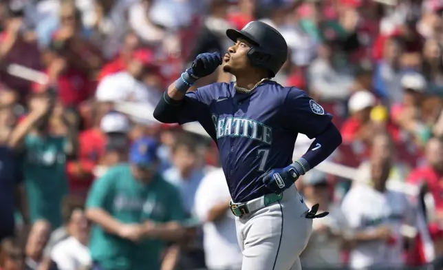 Seattle Mariners' Jorge Polanco rounds the bases after hitting a two-run home run during the fifth inning of a baseball game against the St. Louis Cardinals Sunday, Sept. 8, 2024, in St. Louis. (AP Photo/Jeff Roberson)