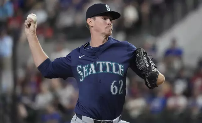 Seattle Mariners starting pitcher Emerson Hancock throws during the first inning of a baseball game against the Texas Rangers, Saturday, Sept. 21, 2024, in Arlington, Texas. (AP Photo/LM Otero)