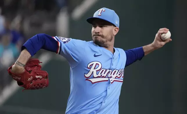 Texas Rangers starting pitcher Andrew Heaney throws during the first inning of a baseball game against the Seattle Mariners Sunday, Sept. 22, 2024, in Arlington, Texas. (AP Photo/LM Otero)