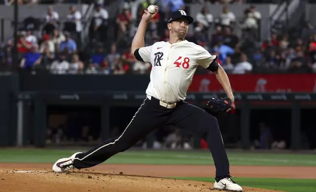 Texas Rangers starting pitcher Jacob deGrom (48) delivers in the first inning of a baseball game against the Seattle Mariners, Friday, Sept. 20, 2024, in Arlington, Texas. (AP Photo/Richard W. Rodriguez)