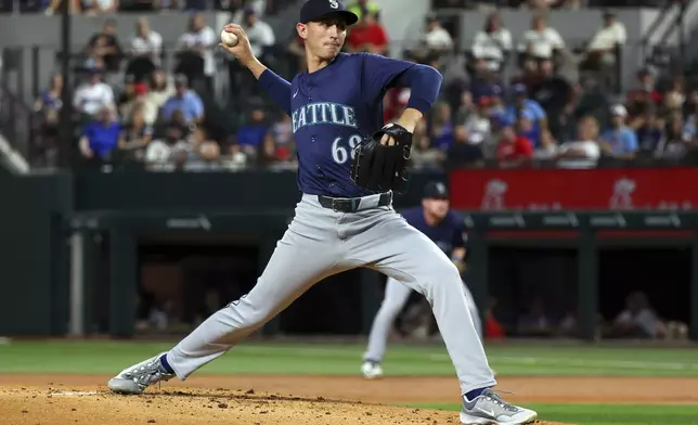 Seattle Mariners starting pitcher George Kirby (68) delivers in the first inning of a baseball game against the Texas Rangers, Friday, Sept. 20, 2024, in Arlington, Texas. (AP Photo/Richard W. Rodriguez)