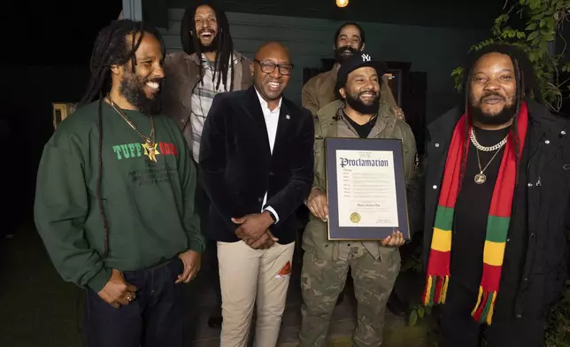 Ziggy Marley, from left, Julian Marley, Borough President of Queens, Donovan Richards Jr., Ky-Mani Marley, Damian Marley and Stephen Marley pose for a portrait on Sunday, Sept. 22, 2024, in New York. Richards presented the brothers with a proclamation establishing Sept. 22 as "Marley Brothers Day" in Queens. (Photo by Matt Licari/Invision/AP)