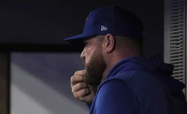 Toronto Blue Jays manager John Schneider watches from the dugout as his team takes on the Miami Marlins in baseball game action in Toronto, Friday, Sept. 27, 2024. (Chris Young/The Canadian Press via AP)