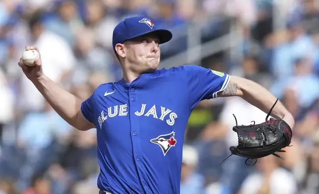 Toronto Blue Jays pitcher Ryan Burr works against the Miami Marlins during first-inning baseball game action in Toronto, Sunday, Sept. 29, 2024. (Chris Young/The Canadian Press via AP)