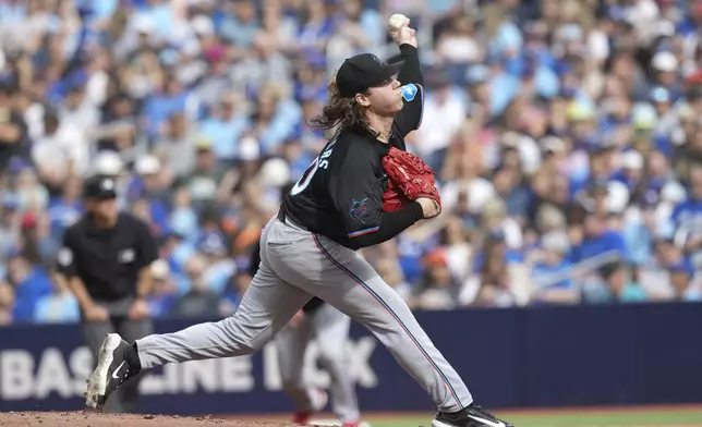 Miami Marlins pitcher Ryan Weathers works against the Toronto Blue Jays during first-inning baseball game action in Toronto, Sunday, Sept. 29, 2024. (Chris Young/The Canadian Press via AP)