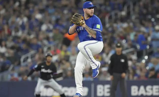 Toronto Blue Jays pitcher Yariel Rodriguez works against the Miami Marlins during first-inning baseball game action in Toronto, Saturday, Sept. 28, 2024. (Chris Young/The Canadian Press via AP)